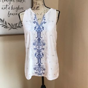 White House Black Market white flowing top.